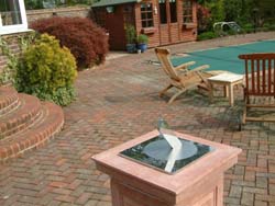 sundial by a swimming pool in Kent