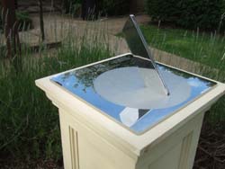 sundial reflections in stainless steel